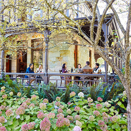 Club Members Tasting Wine on Veranda of Rhine House